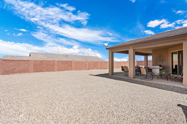 view of yard featuring a patio