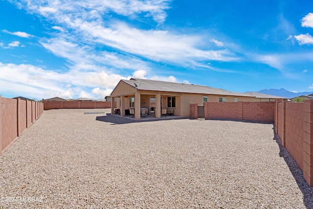 rear view of house with a patio area