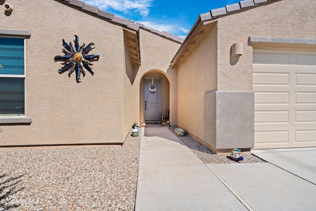 property entrance featuring a garage