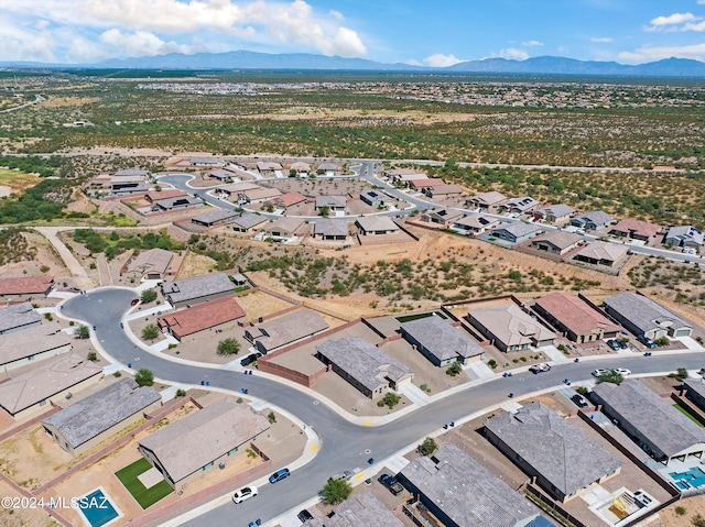 bird's eye view with a mountain view