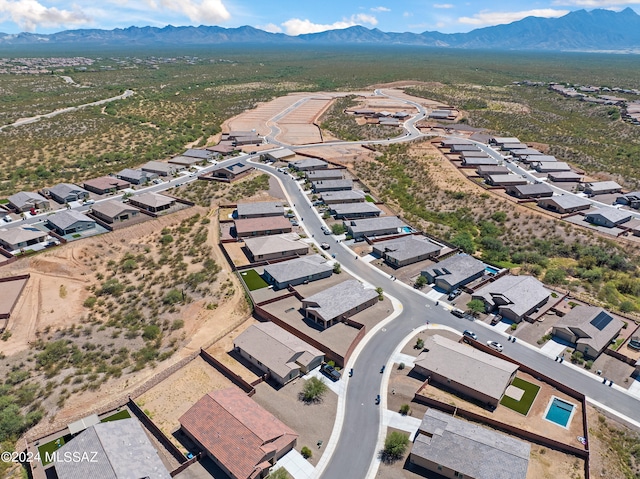 bird's eye view with a mountain view