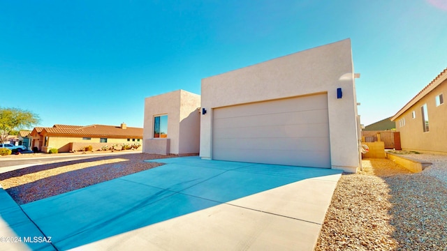 adobe home with a garage