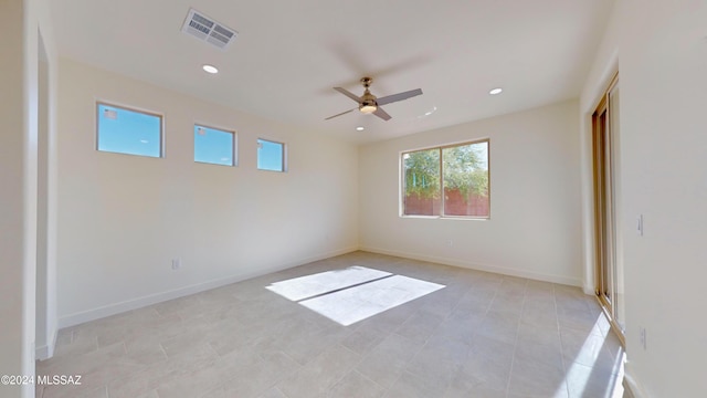 unfurnished room featuring ceiling fan