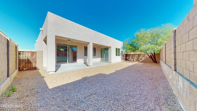 rear view of property with a patio area