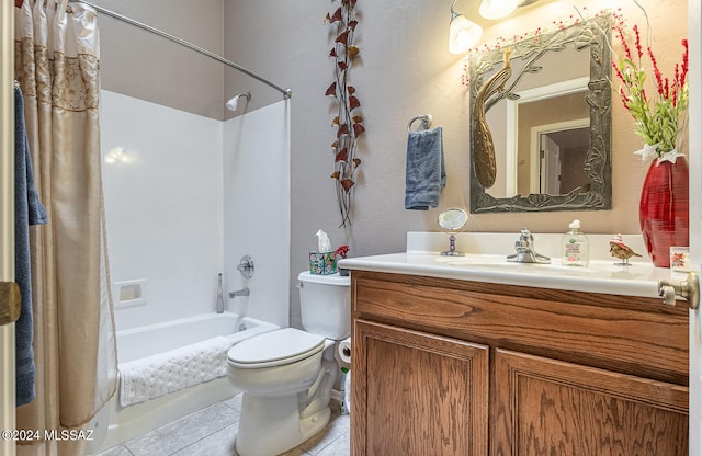 full bathroom with vanity, tile patterned flooring, toilet, and shower / tub combo with curtain