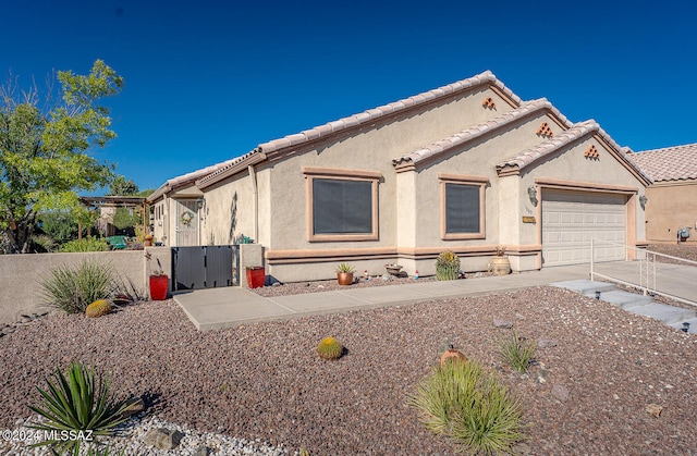 view of front of property with a garage