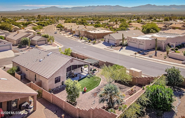 birds eye view of property featuring a mountain view