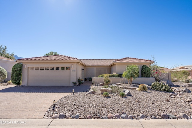 view of front of property featuring a garage