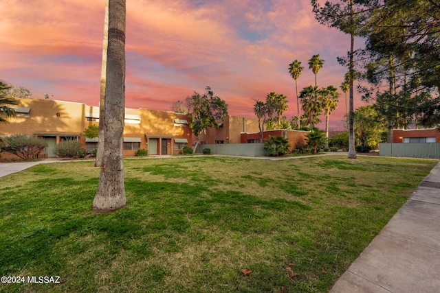 view of front of home with a yard