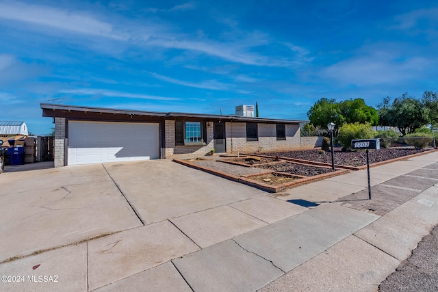 single story home with a garage