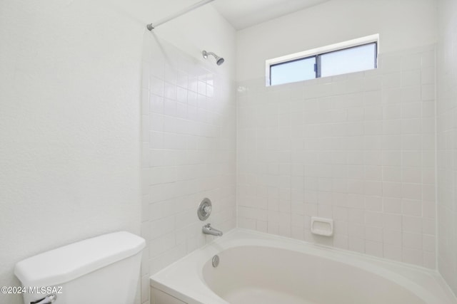 bathroom with  shower combination and toilet