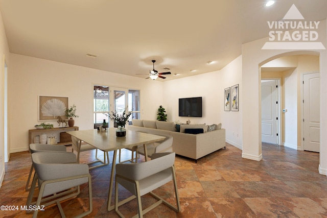 dining area with ceiling fan