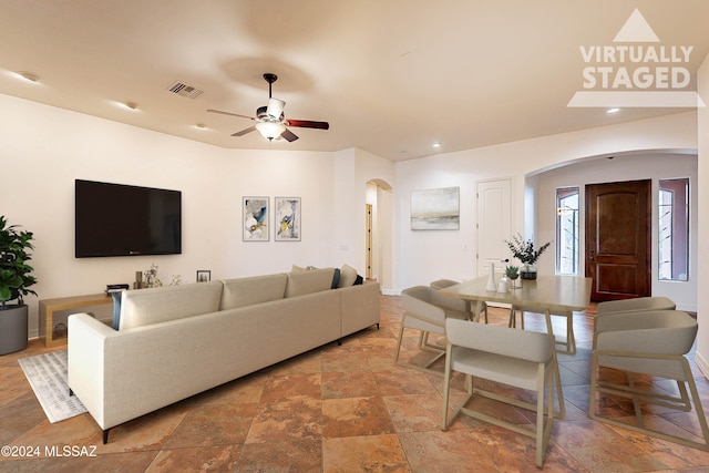 living room with ceiling fan