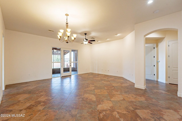 spare room featuring ceiling fan and french doors