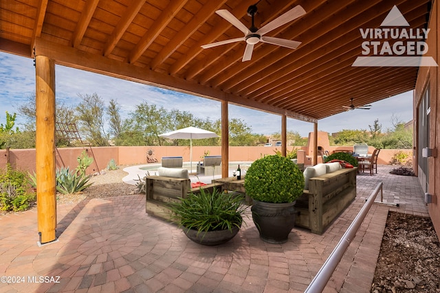 view of patio / terrace featuring an outdoor living space and ceiling fan