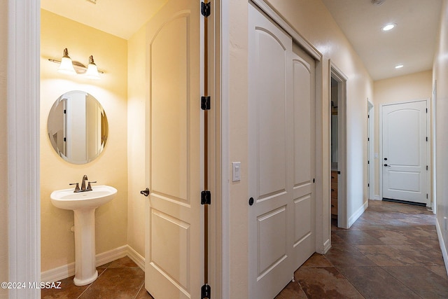 hall featuring sink