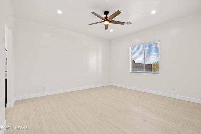 empty room featuring ceiling fan