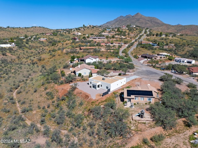 drone / aerial view featuring a mountain view