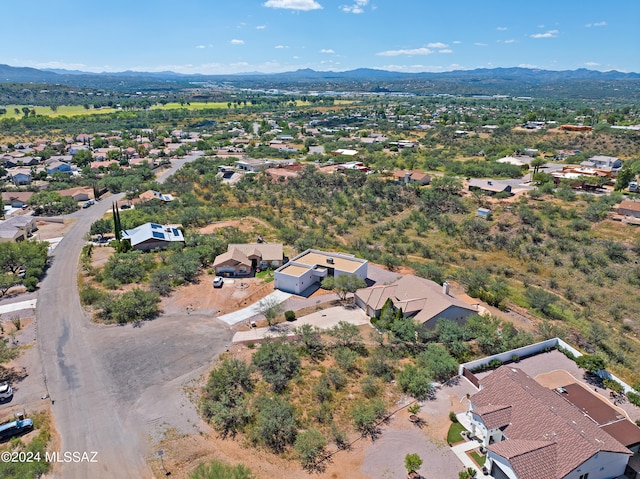 birds eye view of property featuring a mountain view