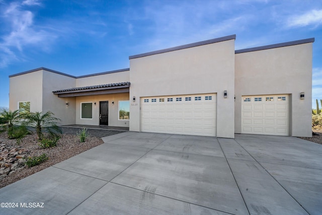 view of front of home with a garage