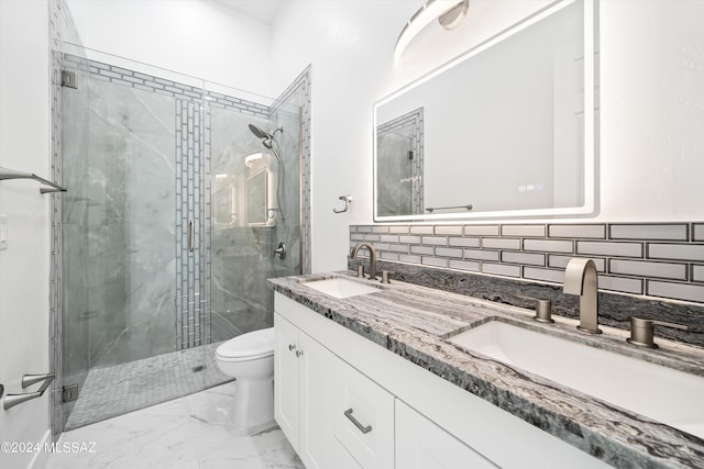 bathroom with vanity, toilet, an enclosed shower, and backsplash