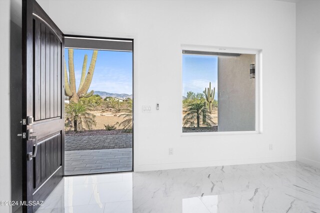 entrance foyer featuring a mountain view