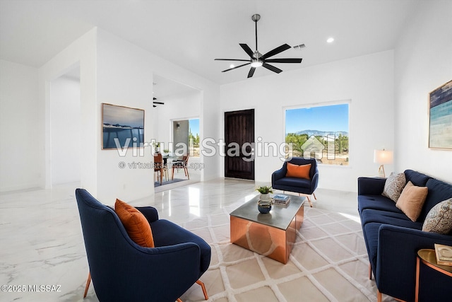 living room featuring ceiling fan