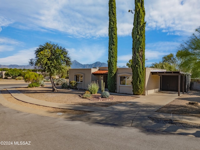 view of front of home with a mountain view