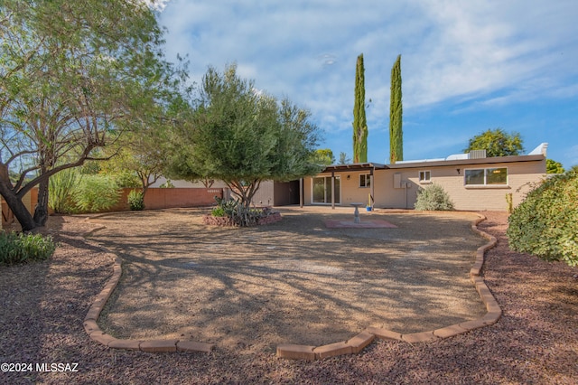 rear view of house with a patio area