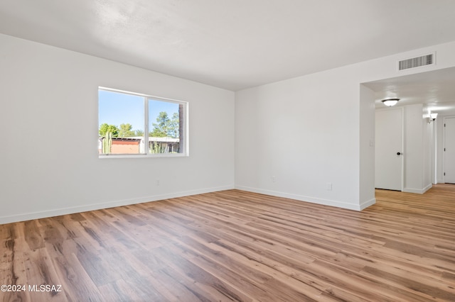 empty room with light wood-type flooring