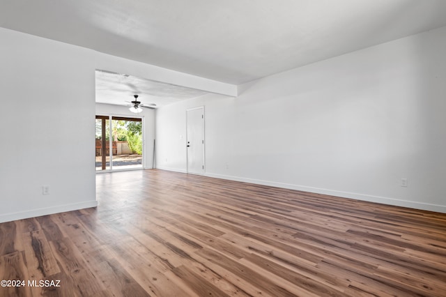 unfurnished room featuring wood-type flooring and ceiling fan