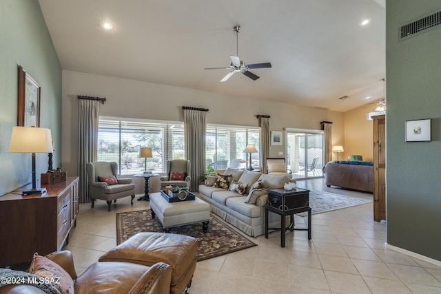 tiled living room featuring ceiling fan and lofted ceiling