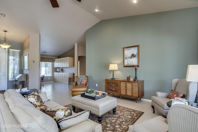 living room featuring light tile patterned floors, ceiling fan, and lofted ceiling