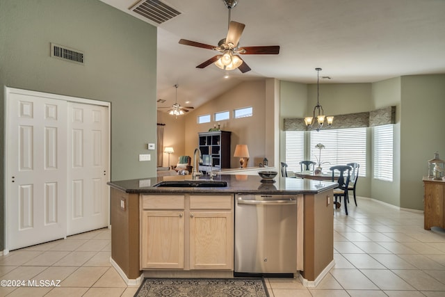 kitchen with dishwasher, light tile patterned flooring, ceiling fan with notable chandelier, and sink