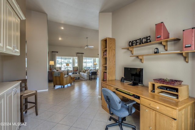 tiled office space with ceiling fan