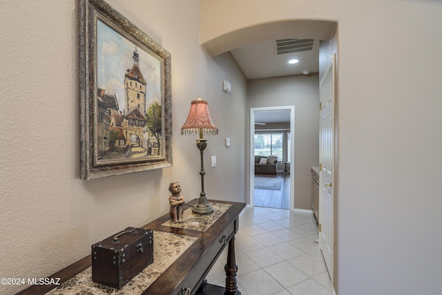 hallway with light tile patterned floors