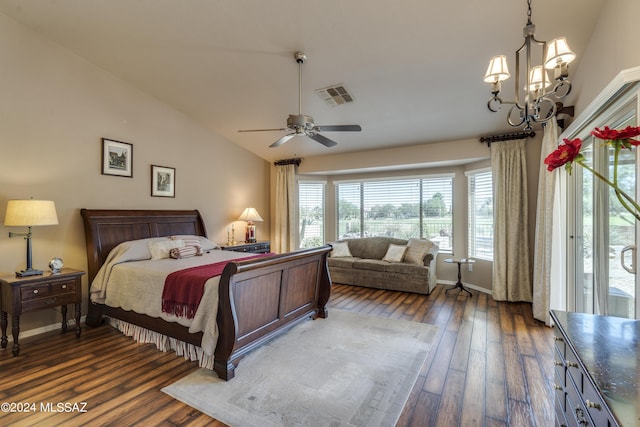 bedroom featuring dark hardwood / wood-style floors, ceiling fan with notable chandelier, access to outside, and vaulted ceiling