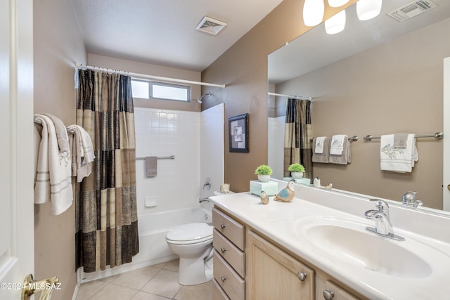 full bathroom featuring tile patterned flooring, vanity, toilet, and shower / bath combo with shower curtain