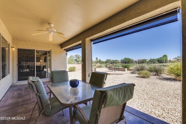 view of patio / terrace featuring ceiling fan