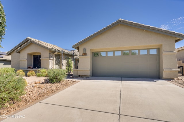 view of front of home with a garage