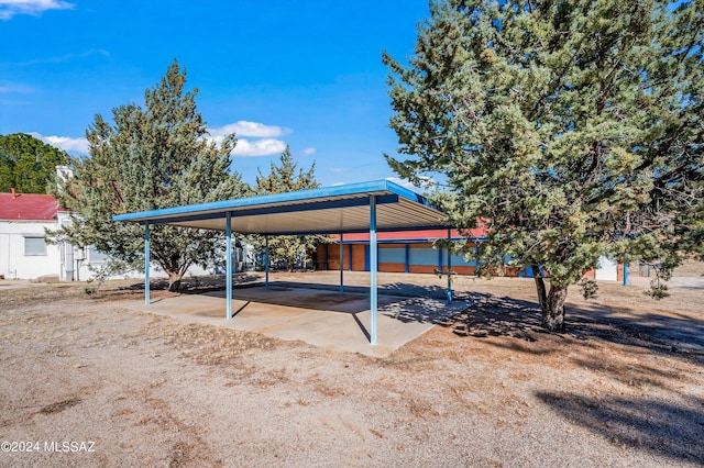 view of parking with a carport