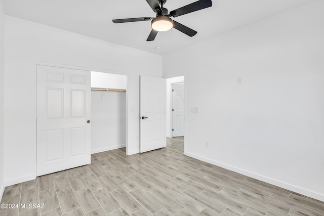 unfurnished bedroom featuring a closet, ceiling fan, and light hardwood / wood-style flooring