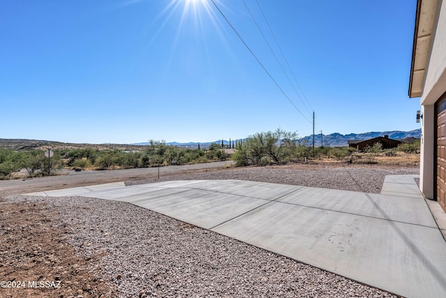 view of patio with a mountain view