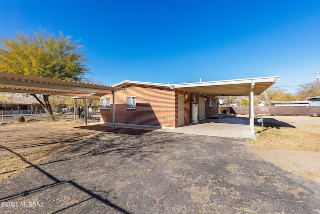 view of front of house with a carport