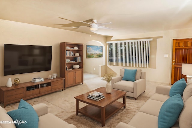 living room featuring light tile patterned floors and ceiling fan