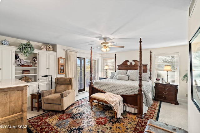 bedroom with multiple windows, carpet flooring, ceiling fan, and access to exterior