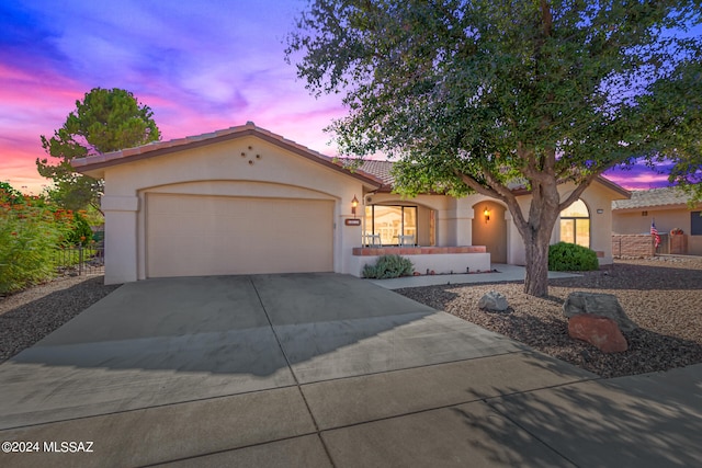 view of front of home featuring a garage