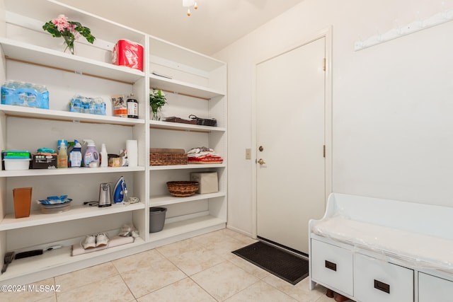 mudroom with light tile patterned floors