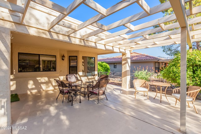 view of patio featuring a pergola