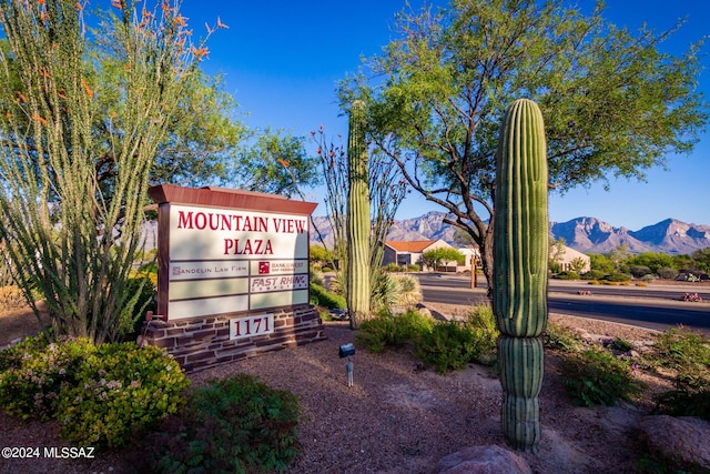 community sign featuring a mountain view